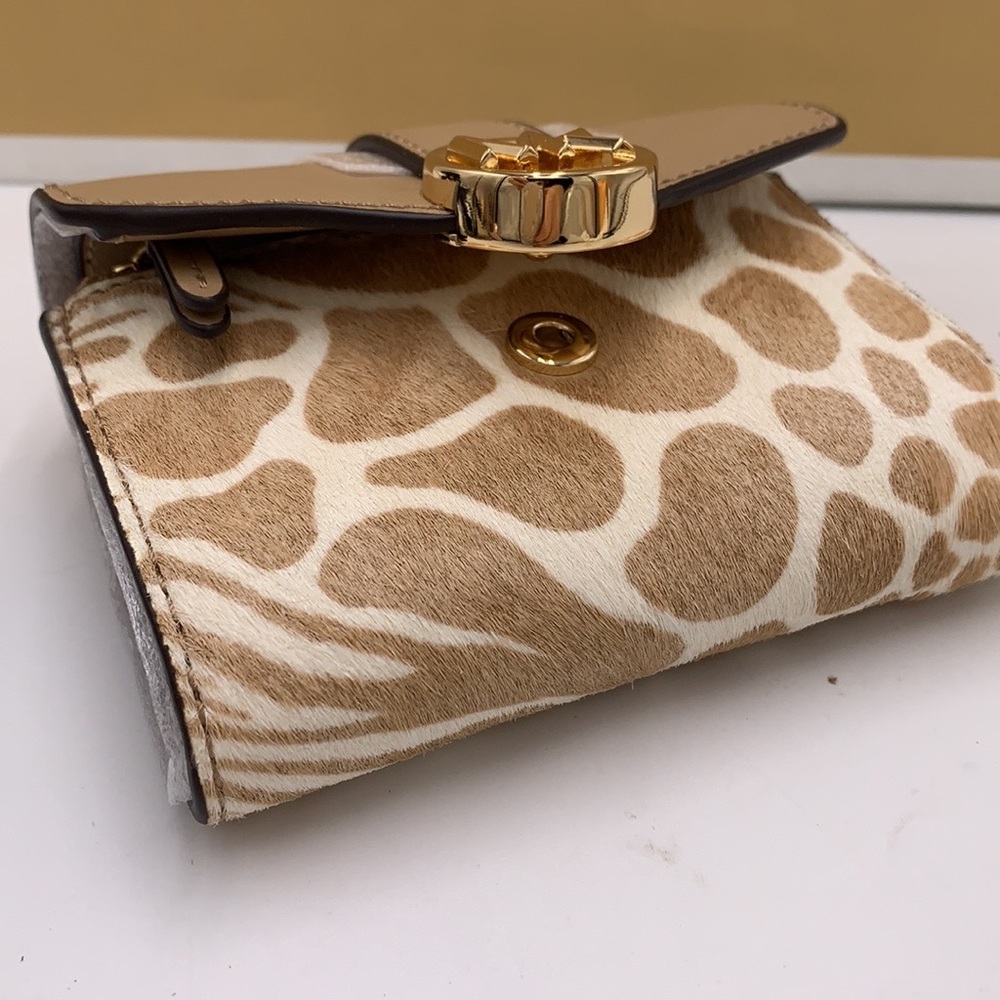 MICHAEL KORS
Carmen Medium Flap Bifold Faux Fur-Leather Wallet
Camel color - Picture 7 of 13